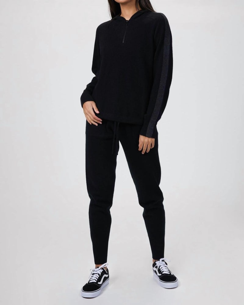 Front of a model wearing a size L Quarterzip Hoodie in Black in Black by NAADAM. | dia_product_style_image_id:334047